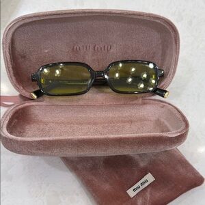 Miu Miu Black Sunglasses with Yellow Tint